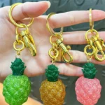 Glitter Pineapple Resin Keychain, sparkling glitter resin fruit bag charm with gold metal hardware