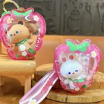 Customizable Yummy White Rabbit Strawberry Inflatable Pouch Keychain, cute strawberry-shaped storage bag charm with bear doll inside