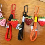 Realistic Strawberry Charm With Braided Lanyard, lifelike resin strawberry bag key pendant with carabiner clip