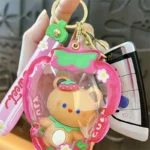 Customizable Yummy White Rabbit Strawberry Inflatable Pouch Keychain, cute strawberry-shaped storage bag charm with bear doll inside