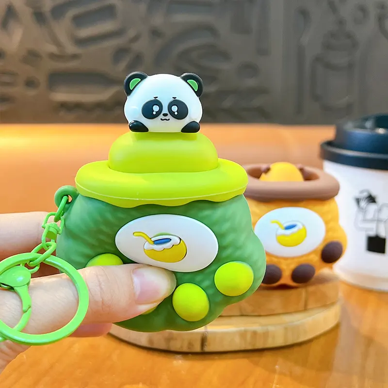 Cartoon Paw-Shaped Creative-Style Keychain, cute squeeze fidget bag pendant with coconut drink pattern