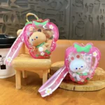 Customizable Yummy White Rabbit Strawberry Inflatable Pouch Keychain, cute strawberry-shaped storage bag charm with bear doll inside