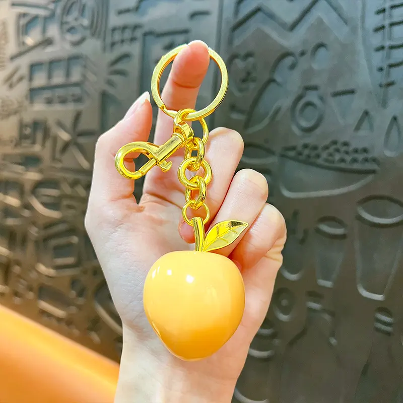 Peach Resin Keychain Pendant, glossy resin fruit bag charm with gold metal hardware