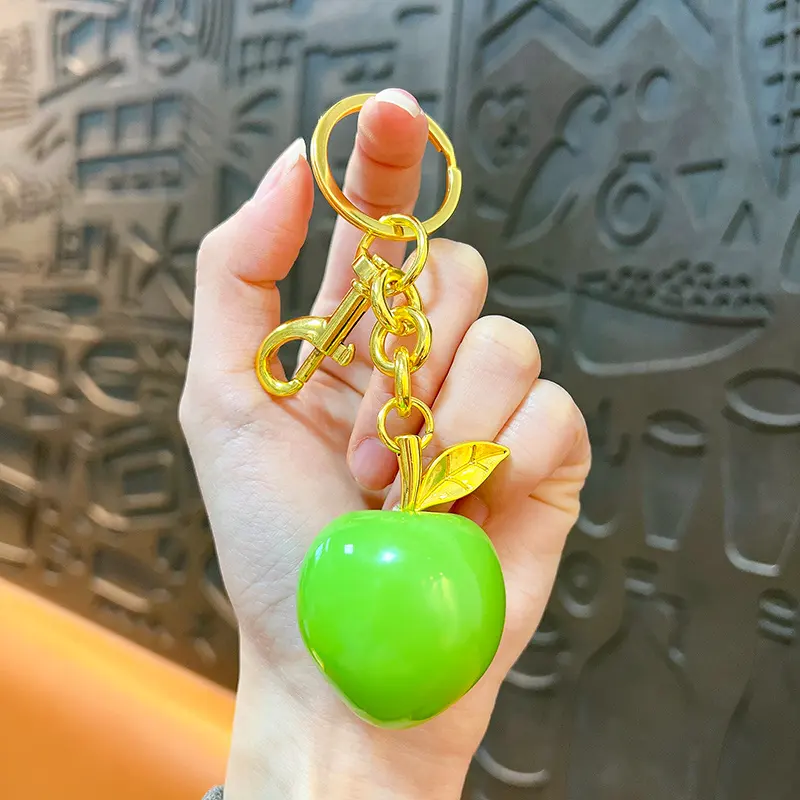 Peach Resin Keychain Pendant, glossy resin fruit bag charm with gold metal hardware