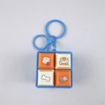 4-Key Fidget Cube Keychain, cute cartoon clicky sensory stress relief bag charm