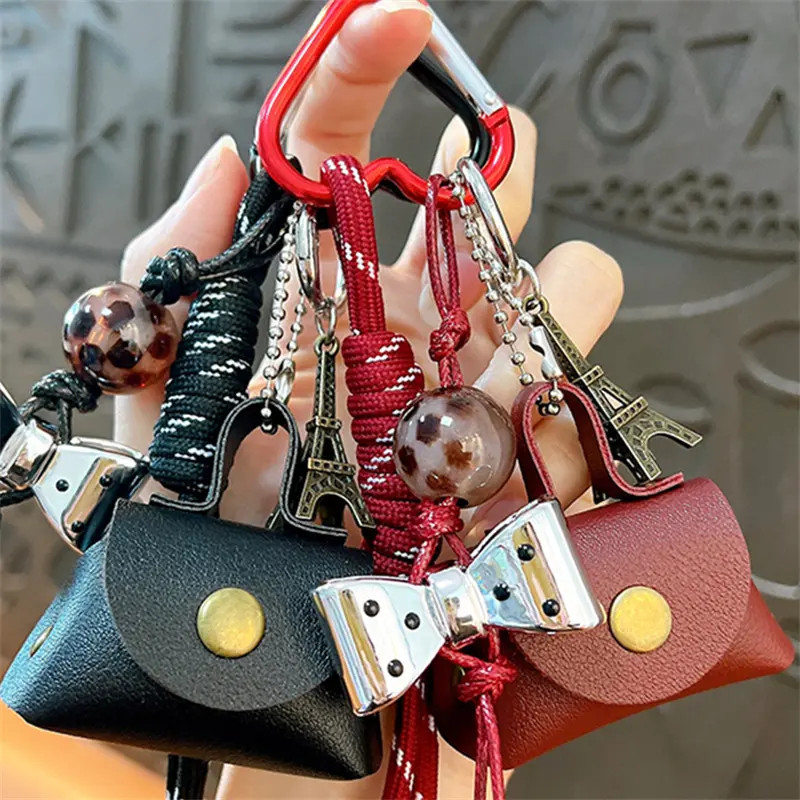 retro eiffel tower bag keychain, vintage woven lanyard with mini leather pouch bag charm