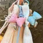 leather rope bowknot keychain, sweet ribbon tassel detachable bag charm with heart pendant