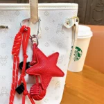 leather star bag keychain, minimalist braided lanyard star charm with woven ball ornament