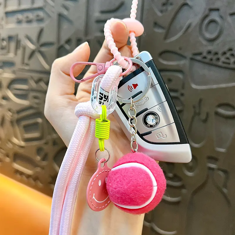 Multi-color woven rope tennis smiley keychain display