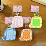 Pink Good Luck Bear Pop It Fidget Keychain, Silicone Stress Relief Squeeze Bubble Bag Charm