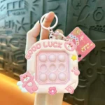 Pink Good Luck Bear Pop It Fidget Keychain, Silicone Stress Relief Squeeze Bubble Bag Charm