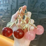 glitter cherry keychain, shiny resin fruit bag pendant with golden metal leaf