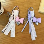 leather rope bowknot keychain, sweet ribbon tassel detachable bag charm with heart pendant