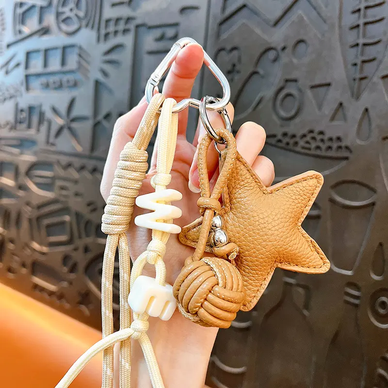 leather star bag keychain, minimalist braided lanyard star charm with woven ball ornament
