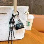 retro eiffel tower bag keychain, vintage woven lanyard with mini leather pouch bag charm