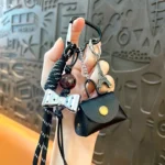 retro eiffel tower bag keychain, vintage woven lanyard with mini leather pouch bag charm