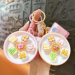 Pink bowl mini bread whack-a-mole push pop fidget toy keychain