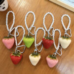 Cute large resin strawberry keychain with pearl chain and heart carabiner, fruit bag charm
