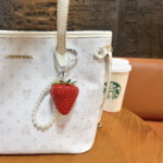 Cute large resin strawberry keychain with pearl chain and heart carabiner, fruit bag charm