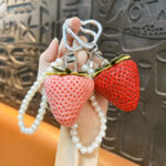 Cute large resin strawberry keychain with pearl chain and heart carabiner, fruit bag charm