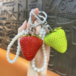 Cute large resin strawberry keychain with pearl chain and heart carabiner, fruit bag charm