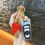 strawberry rotating fidget keychain cute fruit spinner stress relief bag charm pineapple pendant