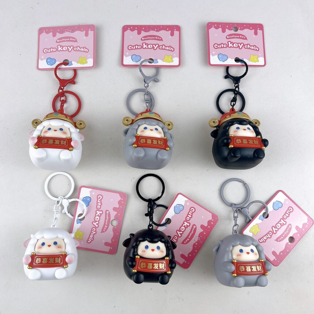 Cute glowing sheep keychain, cartoon lucky sheep bag pendant with congratulations on wealth scroll