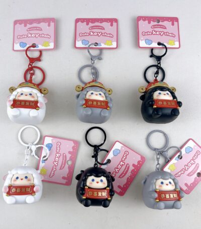 Cute glowing sheep keychain, cartoon lucky sheep bag pendant with congratulations on wealth scroll