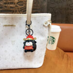 Cute glowing sheep keychain, cartoon lucky sheep bag pendant with congratulations on wealth scroll