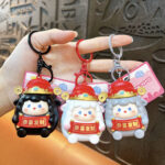 Cute glowing sheep keychain, cartoon lucky sheep bag pendant with congratulations on wealth scroll