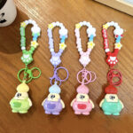 artifact keychain chubby explosive hair doll keychain cute PVC cartoon doll bag charm