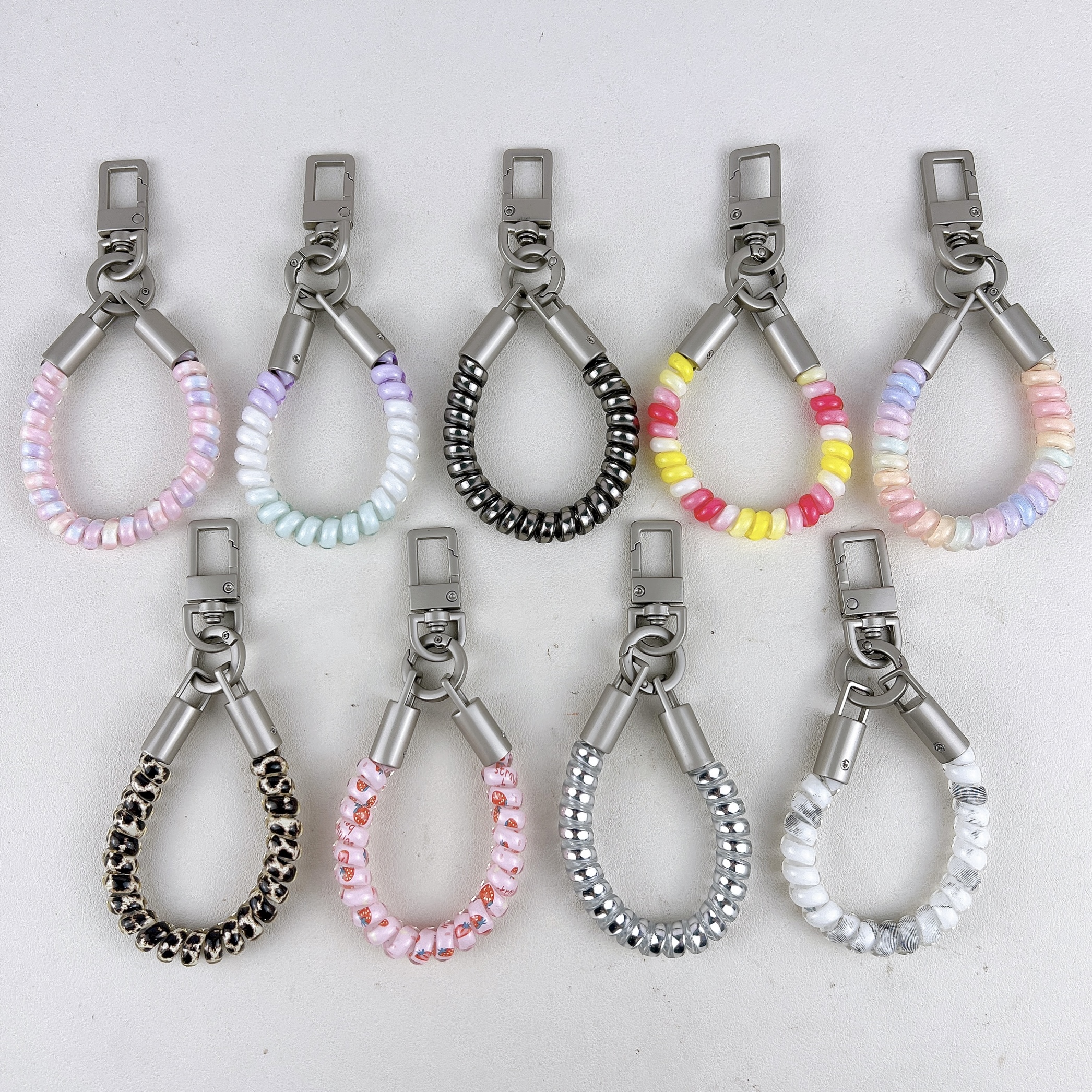 微信图片_20260930115802_57_3 Short stretchable PVC telephone cord keychain, leopard print coil phone charm with metal clasp