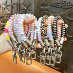 Short stretchable PVC telephone cord keychain, leopard print coil phone charm with metal clasp
