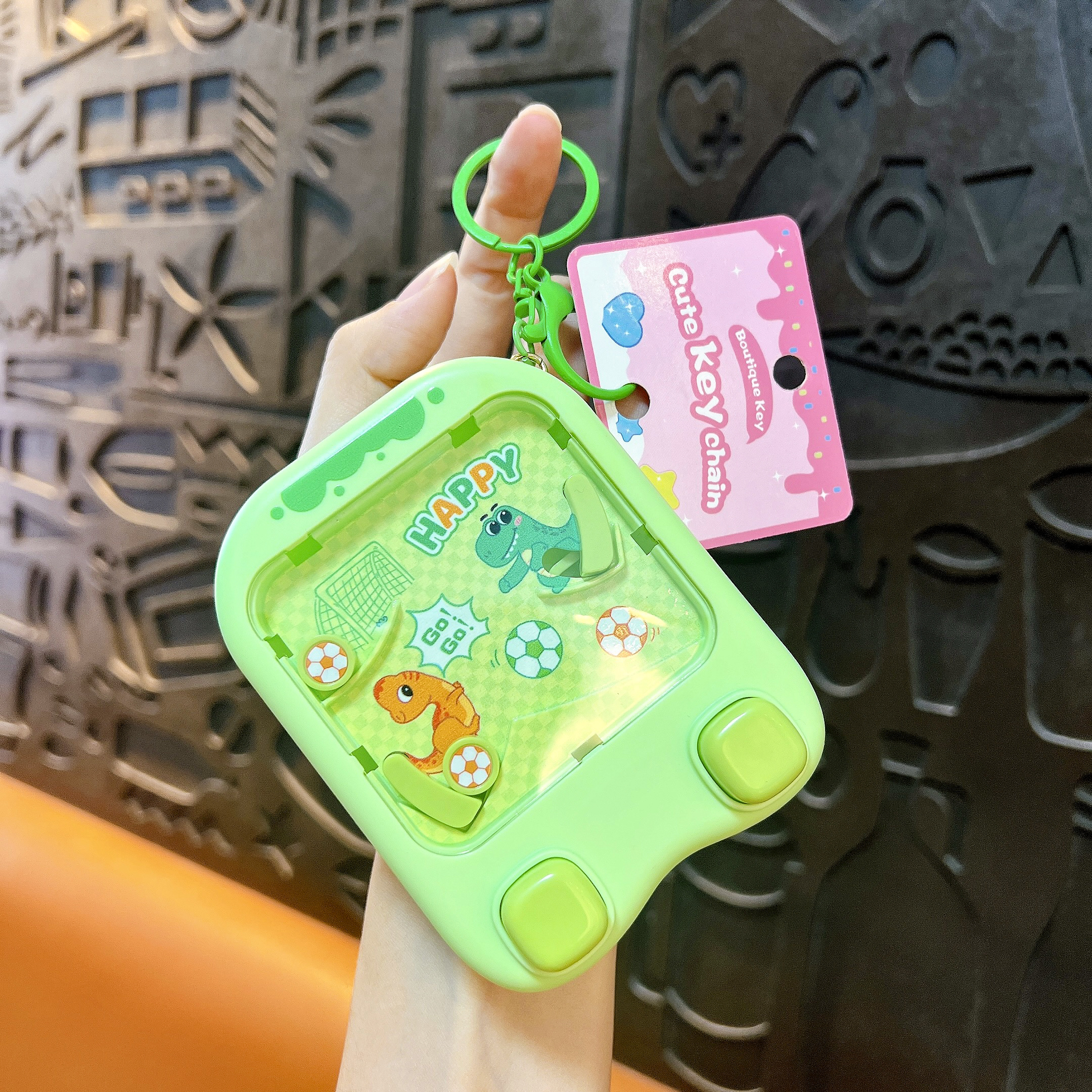 Mini shoot football game keychain, cute dinosaur pattern fidget toy bag charm