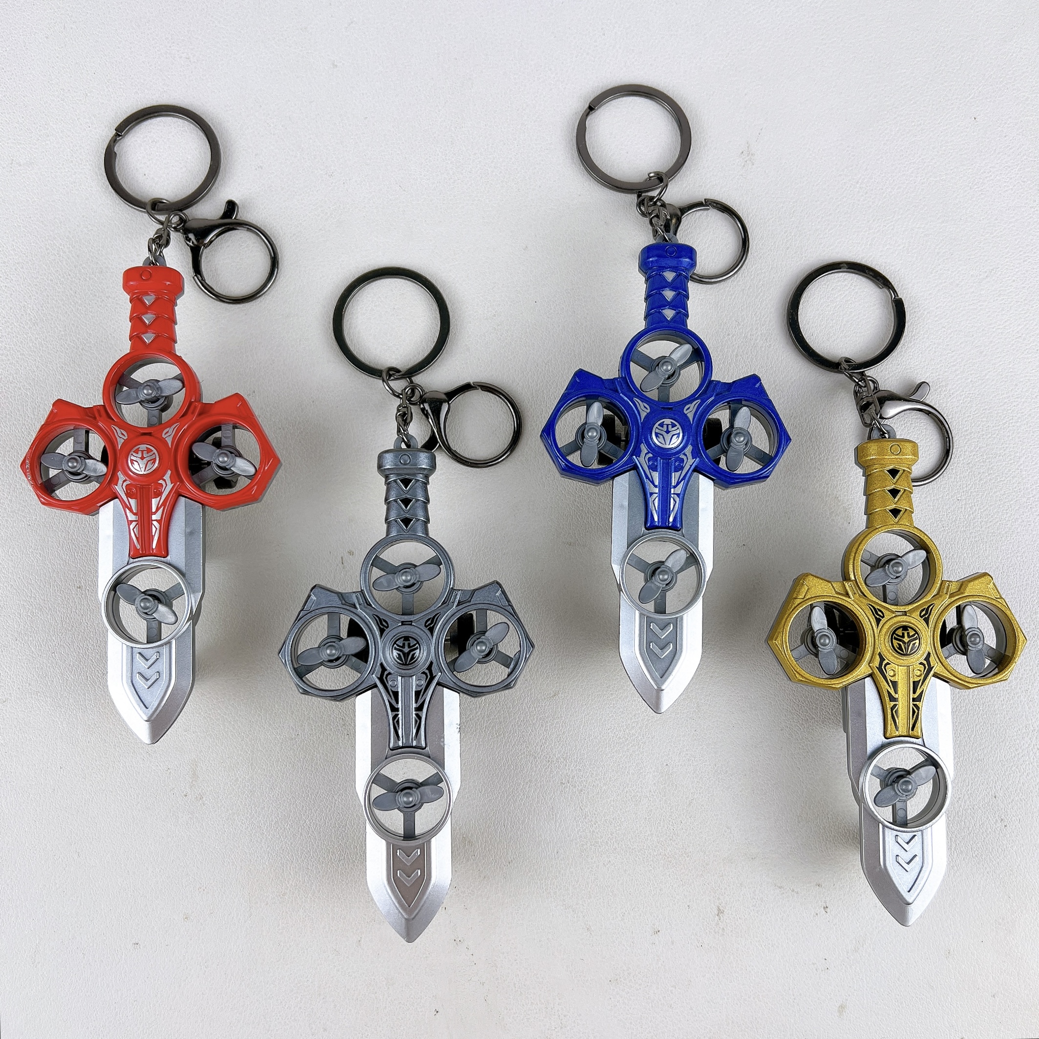 微信图片_20260930120413_140_3 Red pull back sword fidget toy keychain with propeller design, ABS bag charm