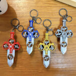 Red pull back sword fidget toy keychain with propeller design, ABS bag charm