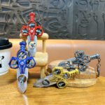Red pull back sword fidget toy keychain with propeller design, ABS bag charm